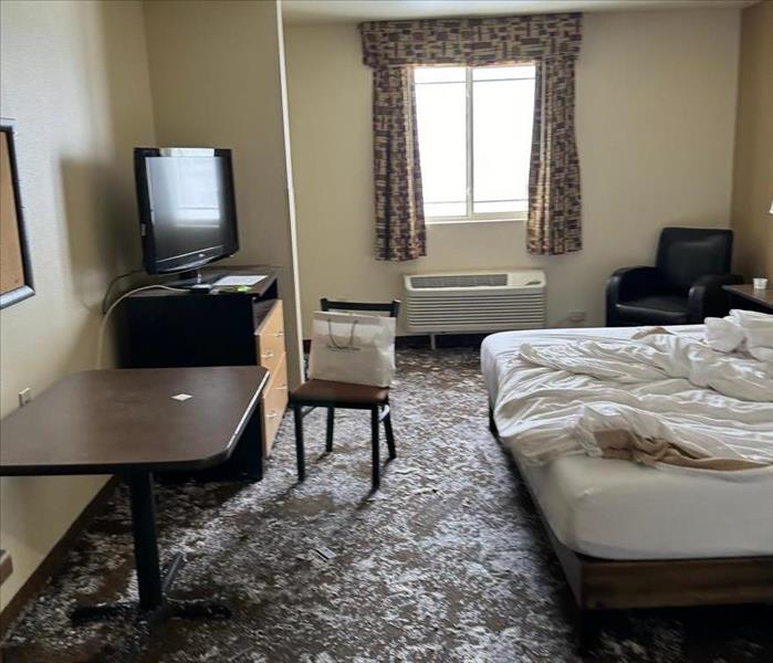 Hotel room with water damage